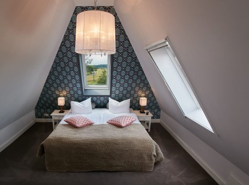 Hotel Gut Vorbeck Zimmer mit Blick auf das Doppelbett